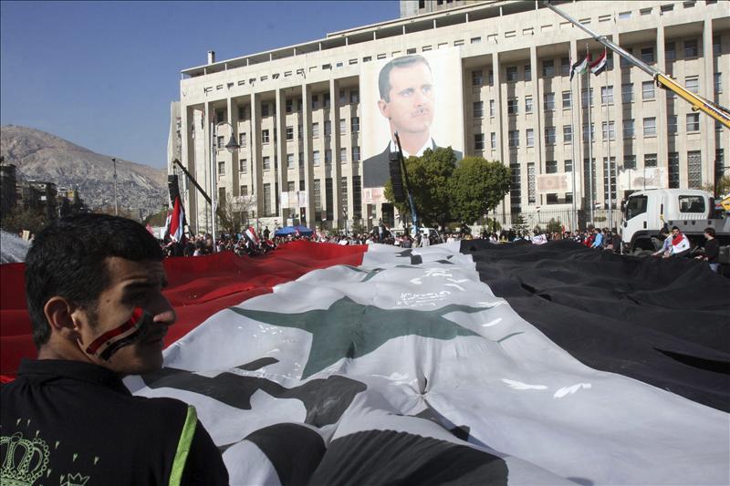 Siria firma el protocolo para el envío de observadores árabes a su territorio