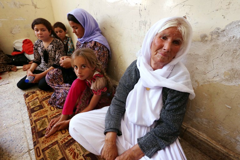 Miles de familias huyen tras llegar el ISIS a zonas cristianas del norte de Irak