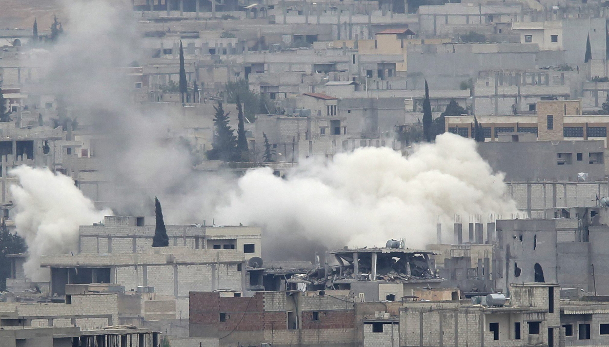 Yihadistas y kurdos luchan calle por calle en la ciudad siria de Kobani