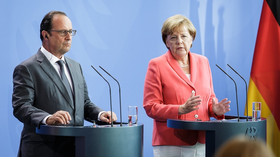 Hollande y Merkel harán una propuesta conjunta para organizar la acogida y reparto justo de refugiados